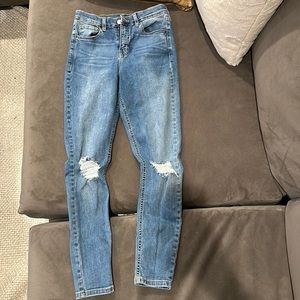 Top shop skinny jeans with light distressed look in the front